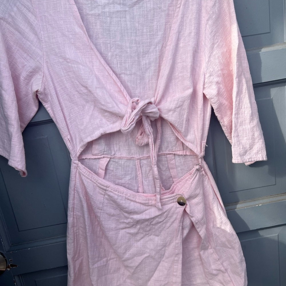 Urban Outfitters light pink short sleeve romper‎ with mid cut off, size 2